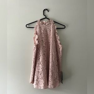 Dusty rose high neck floral top. Never worn.